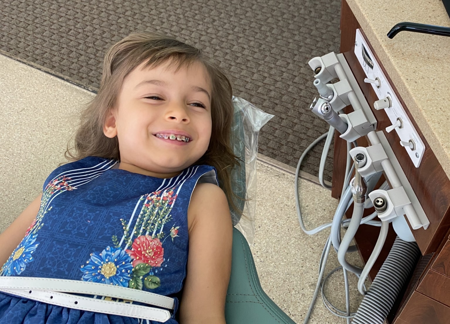 a young pediatric airway patient of Dr. Kevin Adair shows off her amazing smile